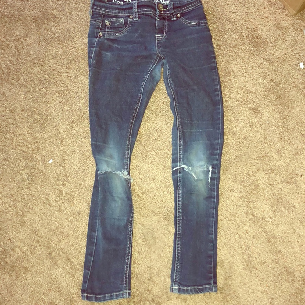 Blue jean pants with holes